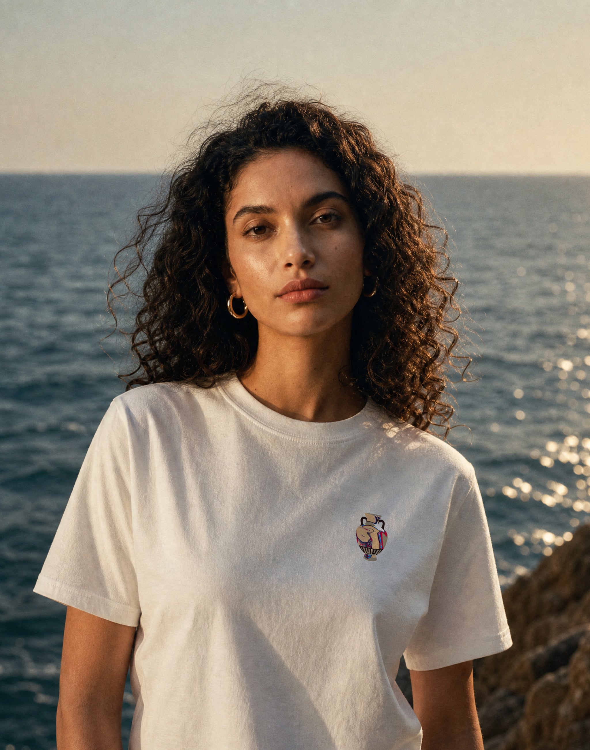 Amphora 05 T-Shirt white front print worn by female model Mediterranean sea, Greece — PERAMA Odyssey