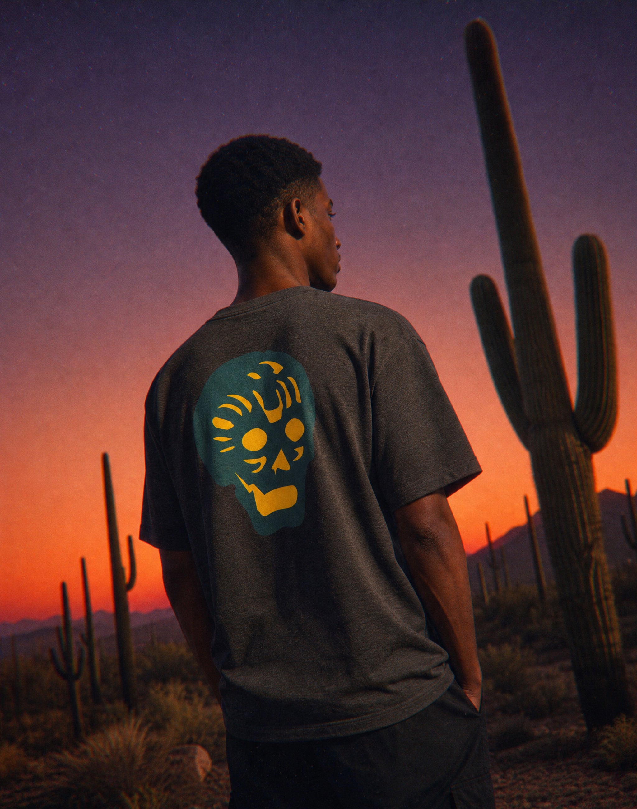Breakpoint yellow and green T-shirt worn by male model in the desert at dusk — PERAMA Classics