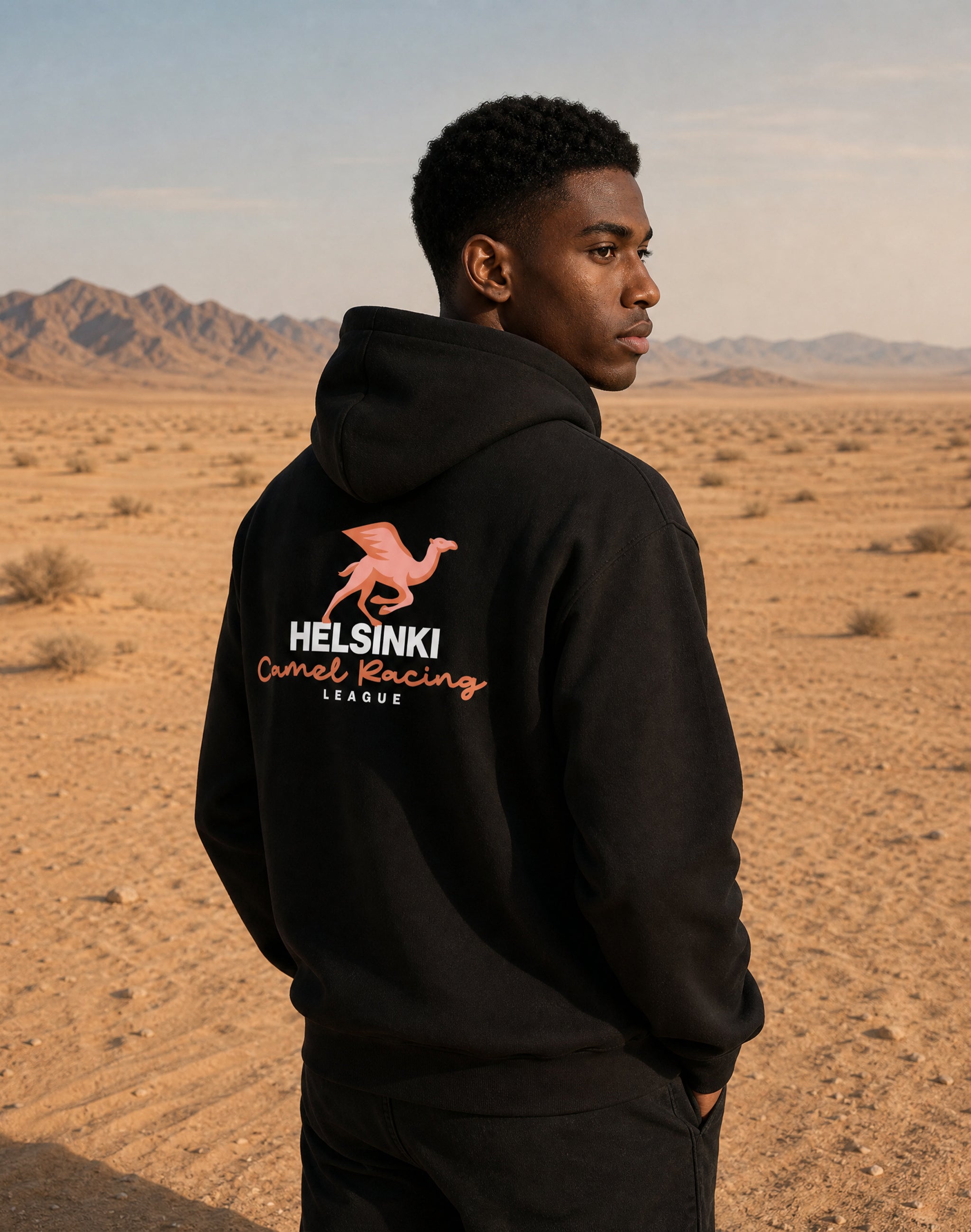 Helsinki Camel Racing League Hoodie worn by male model black back print — PERAMA Sports Federation