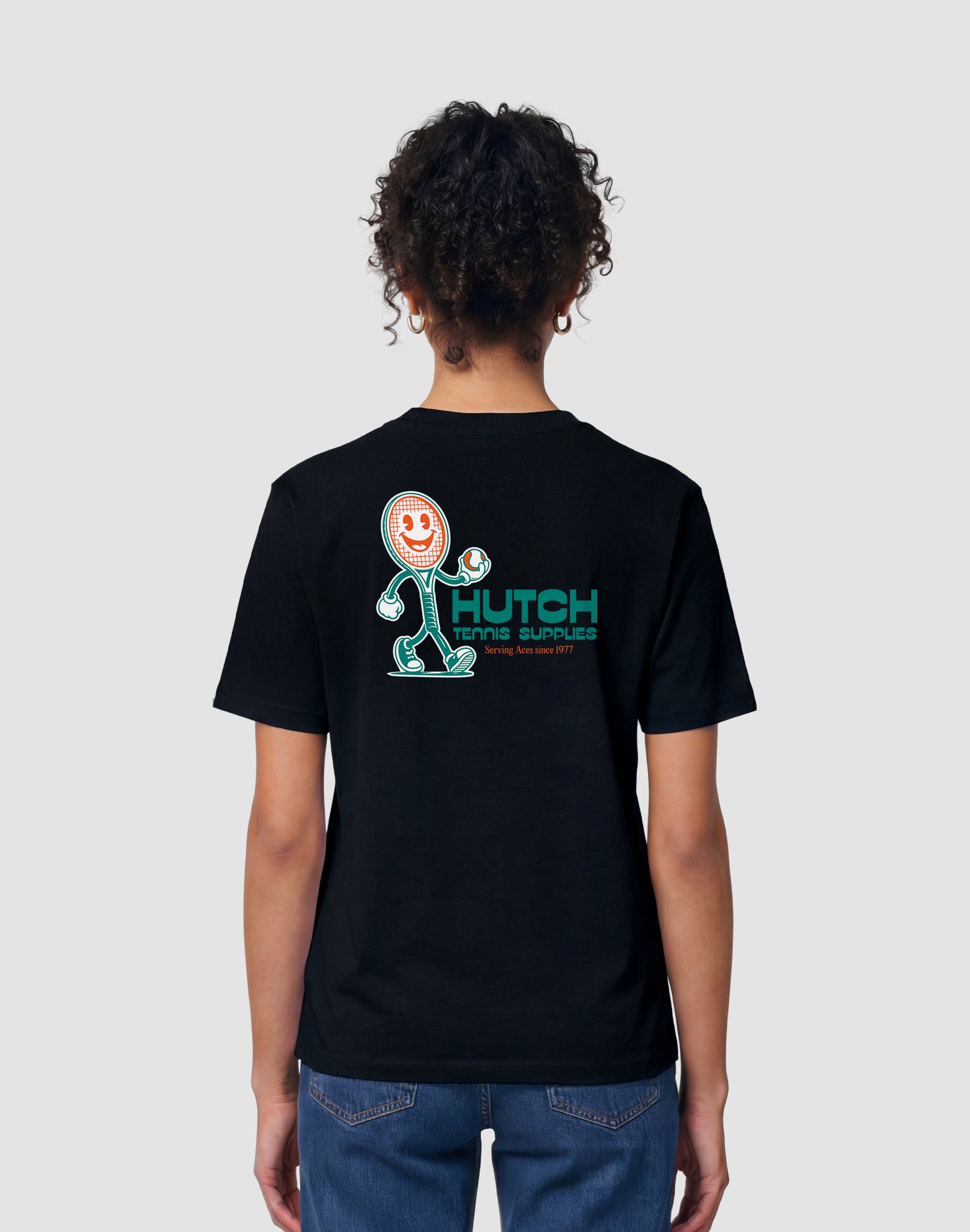 Hutch Tennis Supplies T-Shirt black back print sponsor worn by female model — PERAMA Sponsors