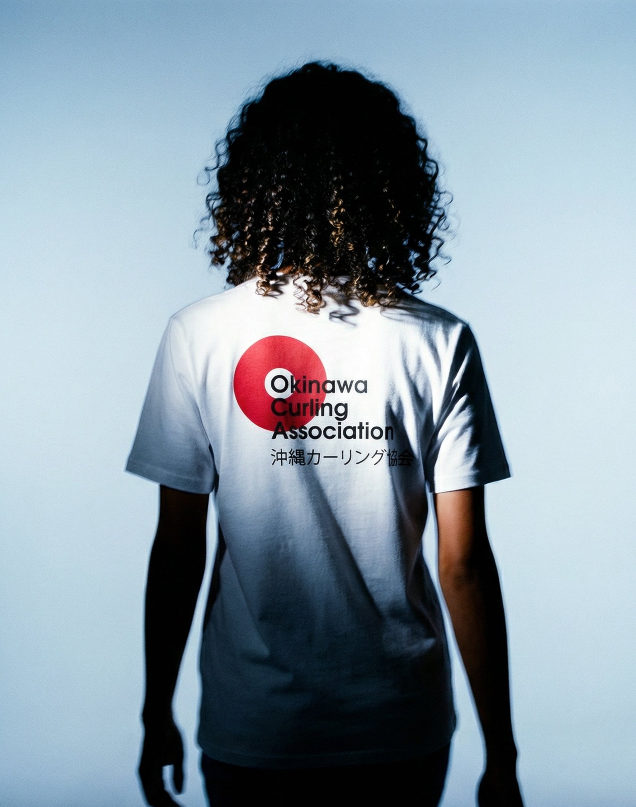 Okinawa Curling Association female model wearing white T-Shirt — PERAMA Federations