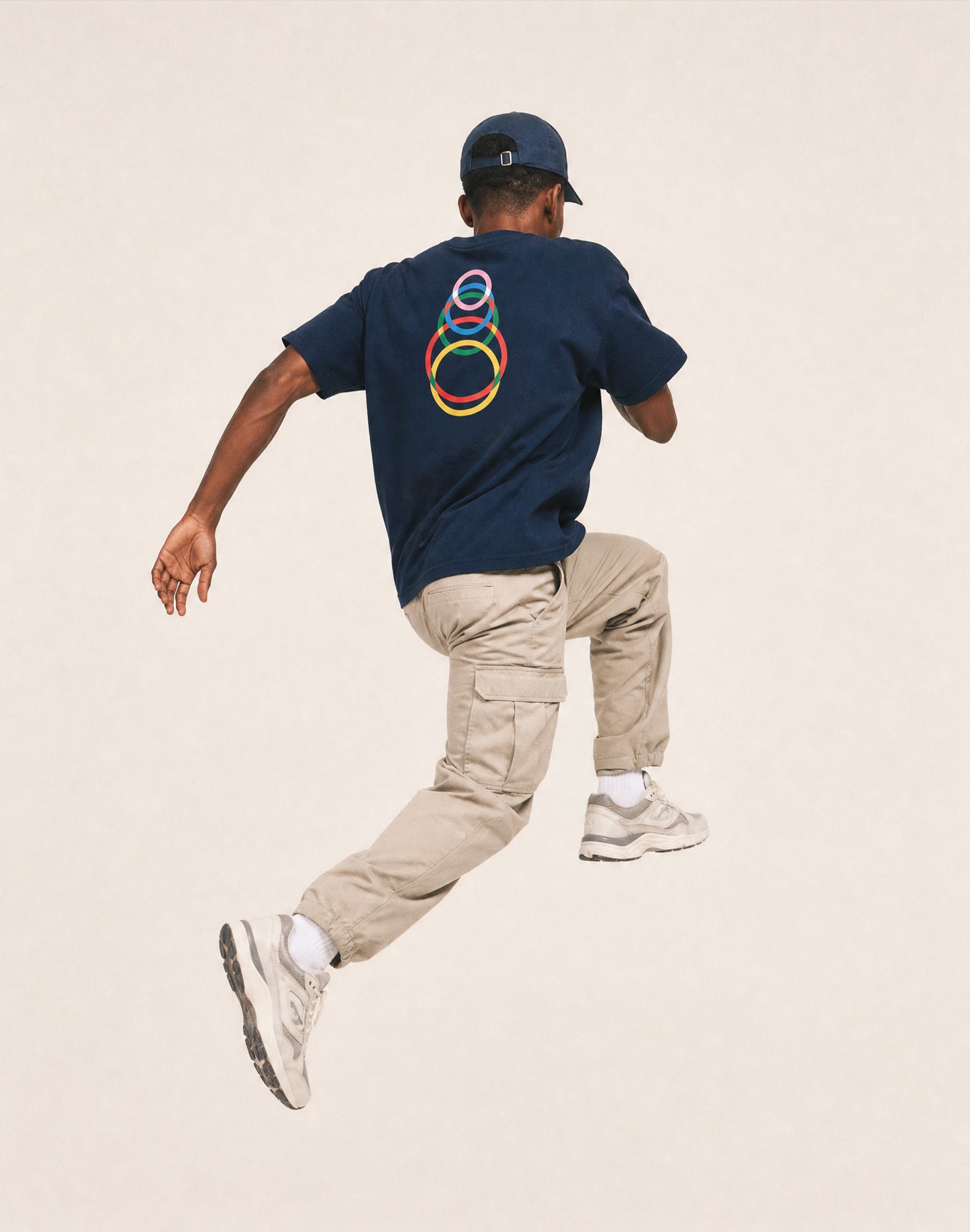Speedball T-Shirt french navy t-shirt back print worn by male model jumping— PERAMA Classics